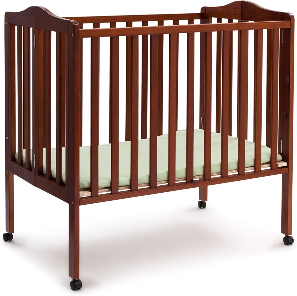 delta children foldable portable crib