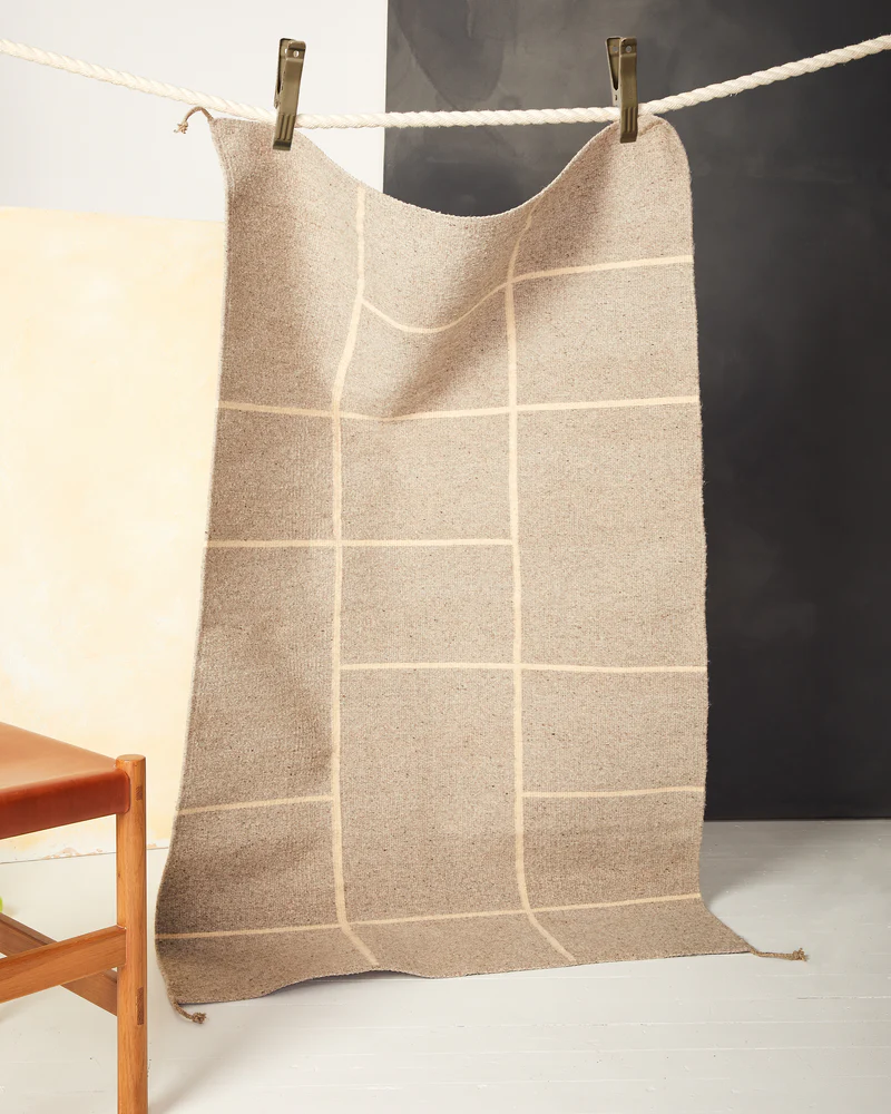 21 Best Non Toxic Furniture Brands & Why You Need Them 8 this is an image of a rug from MINNA, one of the best sustainable furniture brands