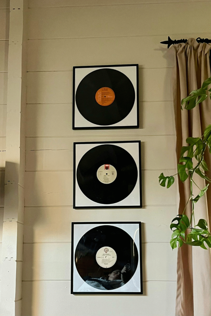 16 Aesthetic Picture Wall Decor Ideas 32 16. Vinyl Record Wall Display