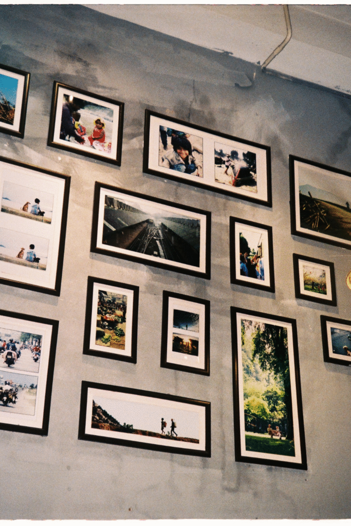 16 Aesthetic Picture Wall Decor Ideas 8 4. Travel Memories Wall