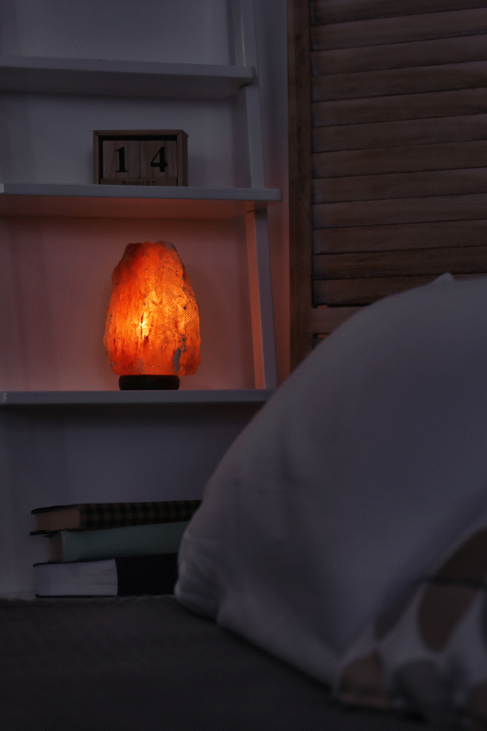 12. Warm Glow Shelf Styling with Natural Accents